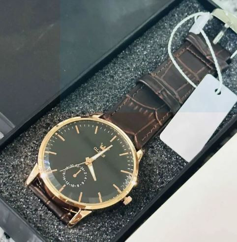 New olevs leather analog sports watch for men-a round shape and men's standard size with pu leather strap